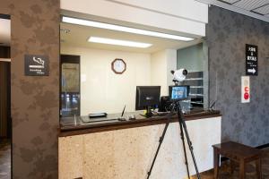 TV a/nebo společenská místnost v ubytování セントラルホテル高萩