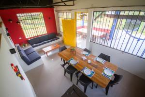 an overhead view of a dining room with a table and chairs at Guacamayo Azul in Iquitos
