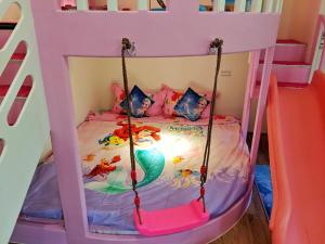 Letto o letti in una camera di 墾丁舍廷親子會館 KT13 Hotel