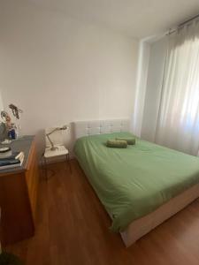 Säng eller sängar i ett rum på Casa del Lago - apartment & rooms