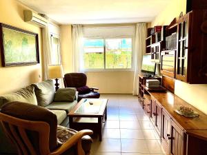 TV a/nebo společenská místnost v ubytování Sitges Living Apartment