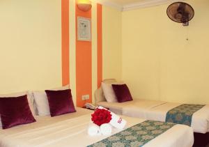 Sun Inns D'mind 3 Seri Kembangan客房内的一张或多张床位