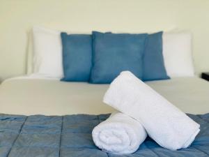 Krevet ili kreveti u jedinici u objektu Steps From The Beach 3br Apt FREE Wifi,Pool,Parking,Apple TV