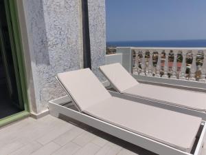 A balcony or terrace at Executive Junior Suite with Balcony