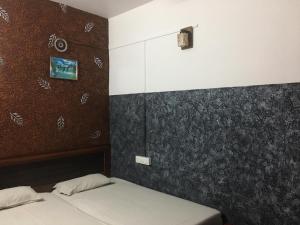 Kvm Tourist Home客房内的一张或多张床位