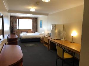 Svetainės erdvė apgyvendinimo įstaigoje Canberra Lyneham Motor Inn