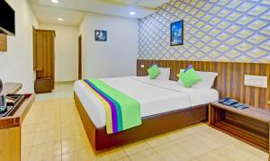 Postel nebo postele na pokoji v ubytování Itsy Hotels Igloo Residency Raja Seat
