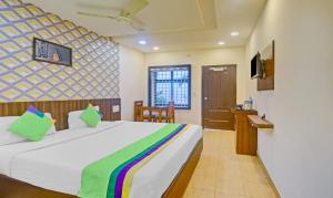 Postel nebo postele na pokoji v ubytování Itsy Hotels Igloo Residency Raja Seat