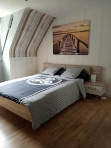 Postel nebo postele na pokoji v ubytování Le Rocher du Samoyède