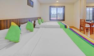 Postel nebo postele na pokoji v ubytování Itsy Hotels Igloo Residency Raja Seat