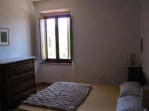 Posteľ alebo postele v izbe v ubytovaní Casa Renata