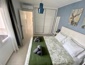 Łóżko lub łóżka w pokoju w obiekcie Oasis View Lanzarote