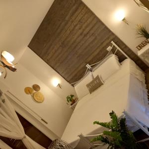 Postel nebo postele na pokoji v ubytování Casa Fiorita 22 Porto Ceresio