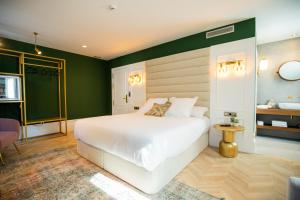 Ένα ή περισσότερα κρεβάτια σε δωμάτιο στο Casa do Estanco