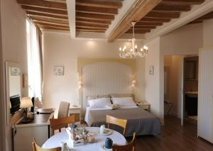 TV a/nebo společenská místnost v ubytování AriediParma - Rooms&apartments