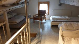 A bed or beds in a room at Charming Swiss Chalet Andermatt