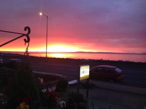 The sunrise or sunset as seen from the guesthouse or nearby 