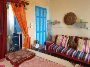 Postel nebo postele na pokoji v ubytování Rural Guest House فندق البيت الريفي