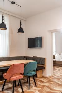 Televízia a/alebo spoločenská miestnosť v ubytovaní Villa Elisa
