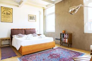 Postel nebo postele na pokoji v ubytování GeTheKey Borgo Terrace Apartment