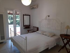 Postel nebo postele na pokoji v ubytování Lemontree Apartments