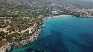 an aerial view of a beach with boats in the water at B&B Margherita in Marina di Camerota