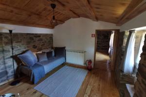 A seating area at Casa do Linho 400 year old country cottage