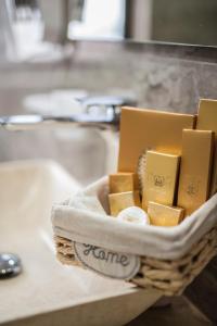 a basket of cheese sitting on a counter at Bernardazzi Grand Hotel in Chişinău