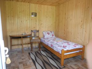 Ein Bett oder Betten in einem Zimmer der Unterkunft Pension, Camping & Biker Station zur Deutschen Eiche
