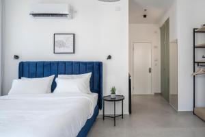Postel nebo postele na pokoji v ubytování De' Mar Florentine Hotel By Peraia