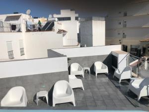 A seating area at Edificio Resort Gran8Nerja