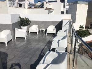 A balcony or terrace at Edificio Resort Gran8Nerja