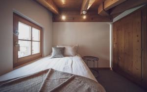 Hotel Waldhuus客房内的一张或多张床位