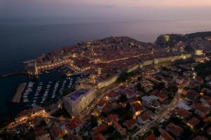 an aerial view of a city with a harbor at Villa Ragusa Vecchia in Dubrovnik