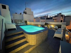 The swimming pool at or close to Edificio Resort Gran8Nerja