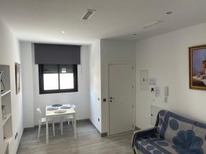 A seating area at Edificio Resort Gran8Nerja