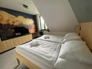 Postel nebo postele na pokoji v ubytování Forest Resort
