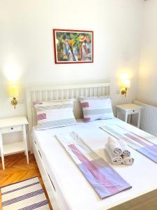 מיטה או מיטות בחדר ב-Guesthouse Gradina