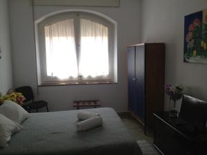 Postel nebo postele na pokoji v ubytování Hotel Comodoro