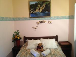 Postel nebo postele na pokoji v ubytování Hotel Comodoro