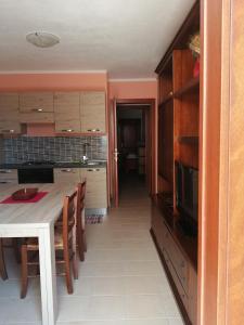 A kitchen or kitchenette at Residence degli ulivi