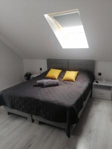 Pokoje i apartamenty MatDar客房内的一张或多张床位