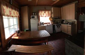 Unien Koti Cottage tesisinde mutfak veya mini mutfak