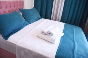 Postel nebo postele na pokoji v ubytování Galata Zade Luxury Boutique Hotel