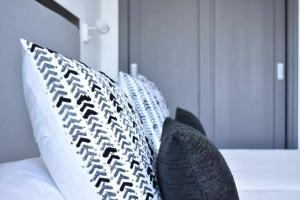Posteľ alebo postele v izbe v ubytovaní Holyhome grey 217 + 9 fotografií