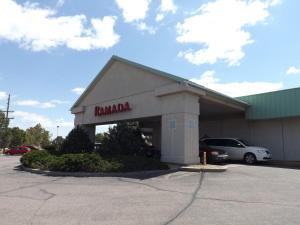 a parking lot of a ramota dealership at Ramada by Wyndham Sterling in Sterling