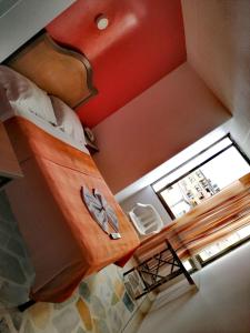 a large bed in a room with at HOTEL YORYTANIA BOUTIQUE in Pitalito