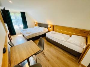 Postel nebo postele na pokoji v ubytování Villa Pinus Slovenský raj - Hotel Čingov dependance