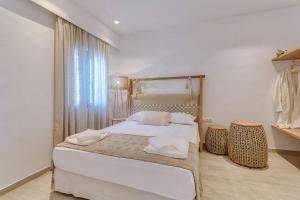 Кровать или кровати в номере Ardilia Cosy Apartments