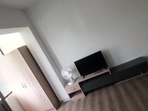 a living room with a flat screen tv on a wall at Villa Centar Ohrid in Ohrid